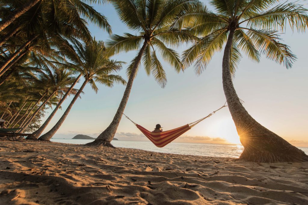 woman in hammock at beach