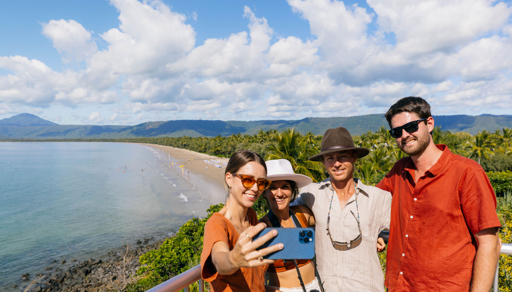 friends taking selfies at four mile beach