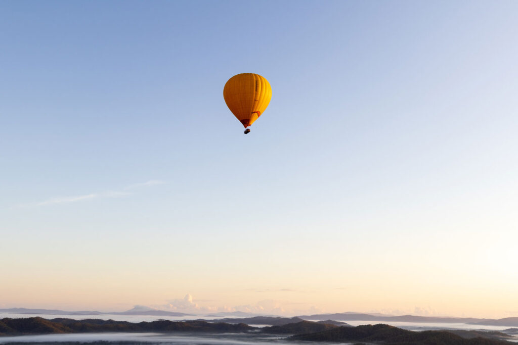 hot air balloon over mareeba at sunrise