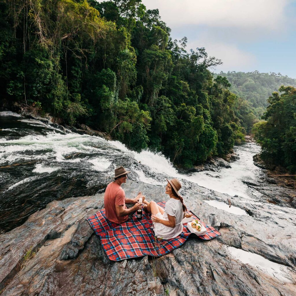 picnic on top of waterfall nautilus aviation