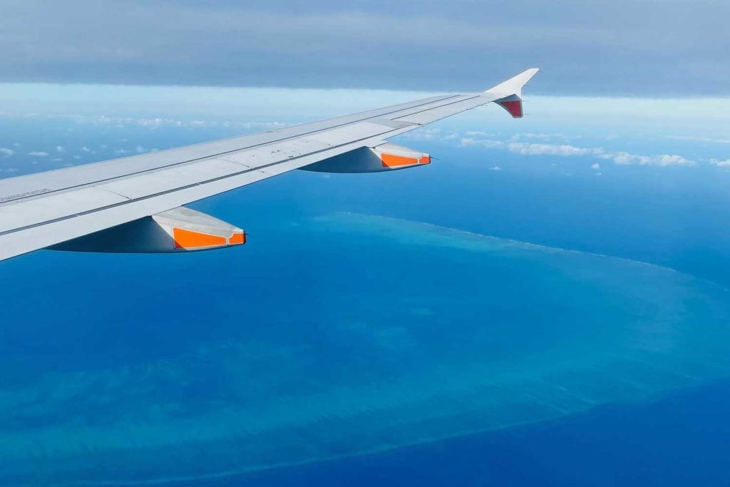 plane over great barrier reef