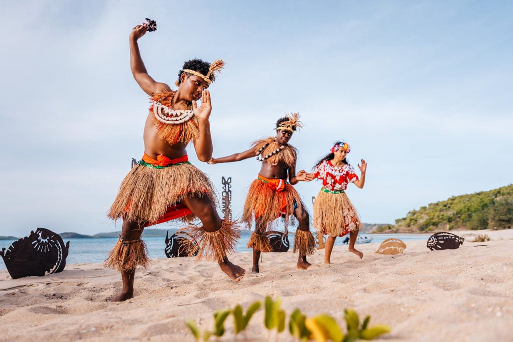 Island Stars Dance Troupe performing on the beach at Prince of Wales Island in the Torres Strait