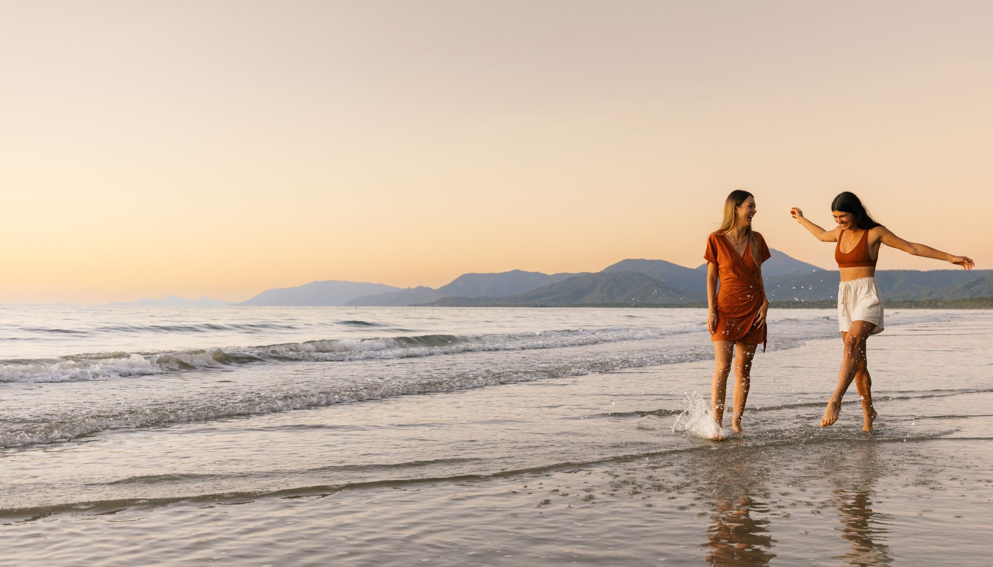 two women on four mile beach port douglas